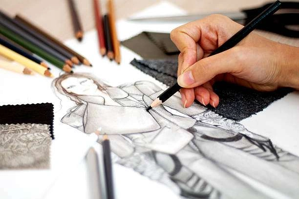 Students learning fashion designing course in Surat